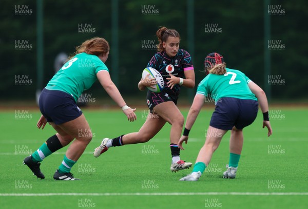 050725  Wales Women U20 v Ireland Women U20, Women’s U20 Six Nations Summer Series - Carys Hughes of Wales takes on Beth Buttimer of Ireland and Sophie Barrett of Ireland