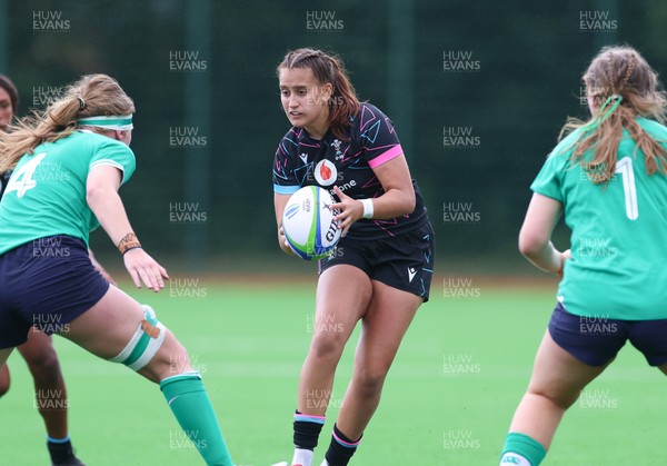 050725  Wales Women U20 v Ireland Women U20, Women’s U20 Six Nations Summer Series - Carys Hughes of Wales takes on Jane Neill of Ireland and Ella Burns of Ireland
