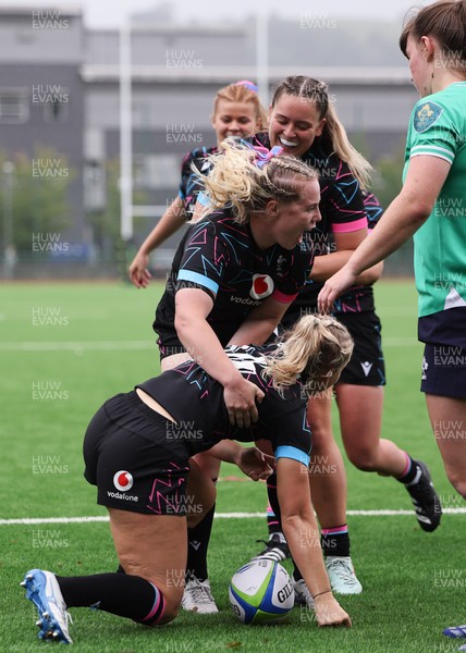 050725  Wales Women U20 v Ireland Women U20, Women’s U20 Six Nations Summer Series - Seren Singleton of Wales celebrates with team mates after she dives in to score Wales’s second try