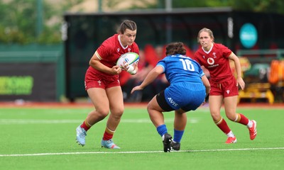 170725 - Wales Women U20 v Italy Women U20, Women’s U20 Six Nations Summer Series - Chiara Pearce of Wales charges through Chiara Cheli of Italy