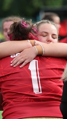 170725 - Wales Women U20 v Italy Women U20, Women’s U20 Six Nations Summer Series - Wales players embrace each other at the end of the match