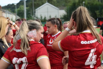 170725 - Wales Women U20 v Italy Women U20, Women’s U20 Six Nations Summer Series - Wales players embrace each other at the end of the match