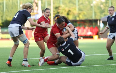 110725 - Wales Women U20 v Scotland Women U20, Women’s U20 Six Nations Summer Series - Jorja Aiono of Wales is held up as she crosses the line