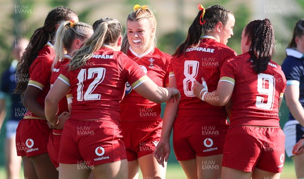 110725 - Wales Women U20 v Scotland Women U20, Women’s U20 Six Nations Summer Series - Mollie Wilkinson of Wales celebrates with team mates after she races in to score try