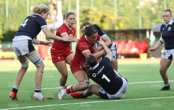 110725 - Wales Women U20 v Scotland Women U20, Women’s U20 Six Nations Summer Series - Jorja Aiono of Wales is held up as she crosses the line