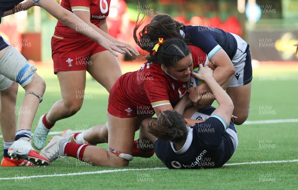 110725 - Wales Women U20 v Scotland Women U20, Women’s U20 Six Nations Summer Series - Jorja Aiono of Wales is held up as she crosses the line