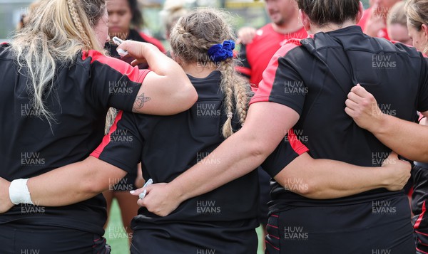 250822 - Wales Women Rugby Units Session - Wales’ Women huddle together during a training session ahead of the match against Canada