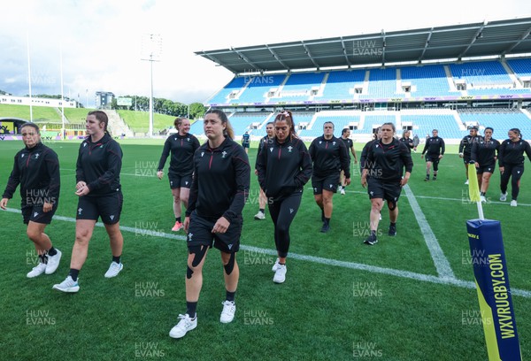 031123 - Wales Women v Australia Women, WXV1 - The Wales players make their way back into the changing room from the pitch on their arrival at the stadium