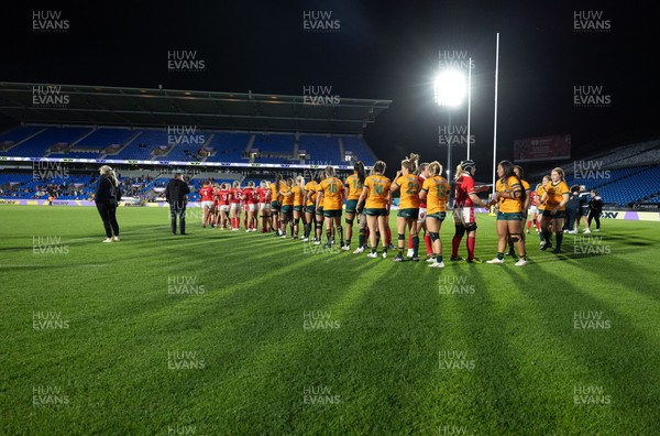 031123 - Wales Women v Australia Women, WXV1 - The Wales and Australia teams congratulate each other at the end of the match