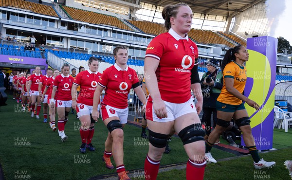 031123 - Wales Women v Australia Women, WXV1 - Abbie Fleming and Kate Williams of Wales walk out at the start of the match