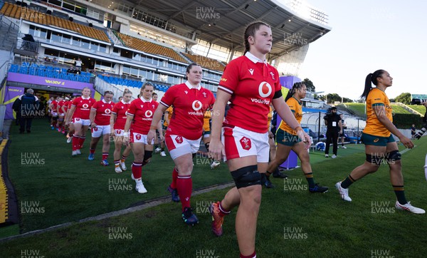 031123 - Wales Women v Australia Women, WXV1 - Kate Williams and Abbey Constable of Wales walk out at the start of the match