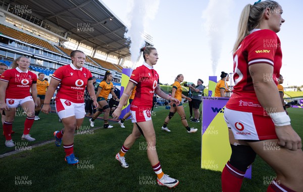 031123 - Wales Women v Australia Women, WXV1 - Kerin Lake and Keira Bevan of Wales walk out at the start of the match