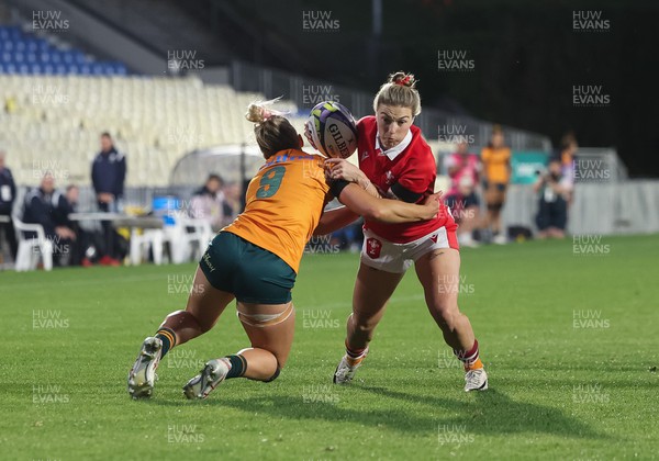 031123 - Wales Women v Australia Women, WXV1 - Keira Bevan of Wales looks to get bast Kaitlan Leaney of Australia
