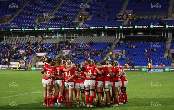031123 - Wales Women v Australia Women, WXV1 - Wales players huddle together at the end of the match