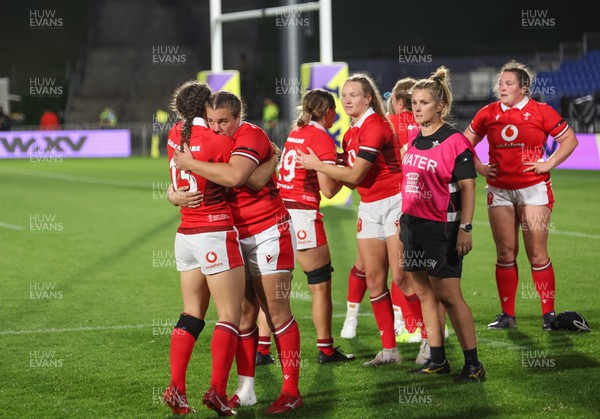 031123 - Wales Women v Australia Women, WXV1 - Carys Phillips of Wales embraces Jasmine Joyce of Wales at the end of the match