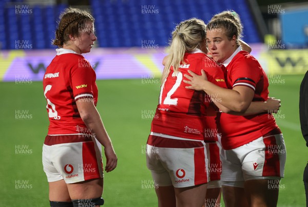 031123 - Wales Women v Australia Women, WXV1 - Carys Phillips of Wales embraces Hannah Bluck of Wales at the end of the match