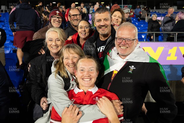 031123 - Wales Women v Australia Women, WXV1 - Carys Cox of Wales with family and friends at the end of the match