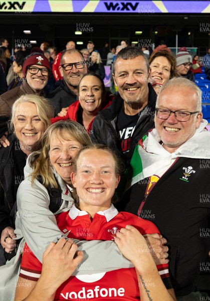 031123 - Wales Women v Australia Women, WXV1 - Carys Cox of Wales with family and friends at the end of the match