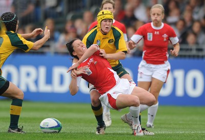 20.08.10 - Wales Women v Australia Women - Women's Rugby World Cup 2010 - Melissa Berry of Wales is tackled by Tui Ormsby(L) of Australia. 