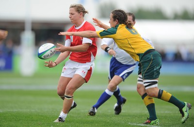 20.08.10 - Wales Women v Australia Women - Women's Rugby World Cup 2010 - Jamie Kift of Wales is tackled by Rebecca Trethowan of Australia. 