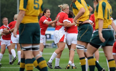 20.08.10 - Wales Women v Australia Women - Women's Rugby World Cup 2010 - Naomi Thomas, Gemma Hallett and Rachel Taylor of Wales celebrate their penalty try. 