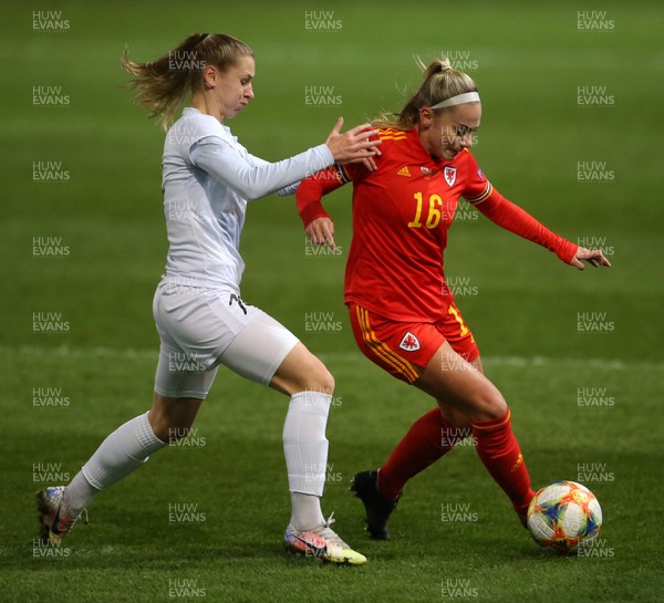011220 - Wales Women v Belarus Women - UEFA Championship Qualifier - Charlotte Estcourt of Wales is tackled by Karina Olkhovik of Belarus