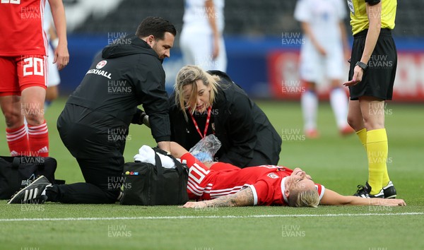 070618 - Wales Women v Bosnia Women - FIFA Women's World Cup Qualifying Round - Jess Fishlock of Wales is treated for an injured before going back on the pitch