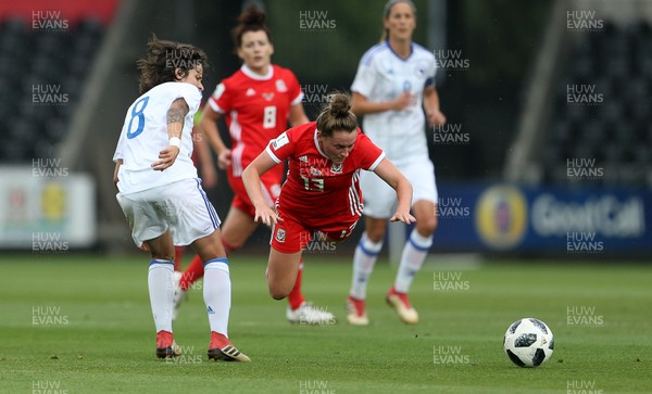 070618 - Wales Women v Bosnia Women - FIFA Women's World Cup Qualifying Round - Rachel Rowe of Wales is tackled by Aida Hadzic of Bosnia