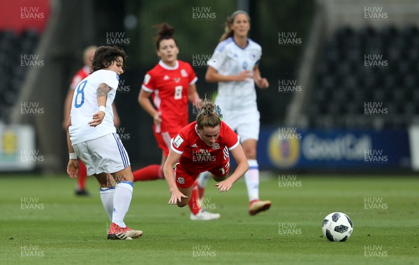 070618 - Wales Women v Bosnia Women - FIFA Women's World Cup Qualifying Round - Rachel Rowe of Wales is tackled by Aida Hadzic of Bosnia