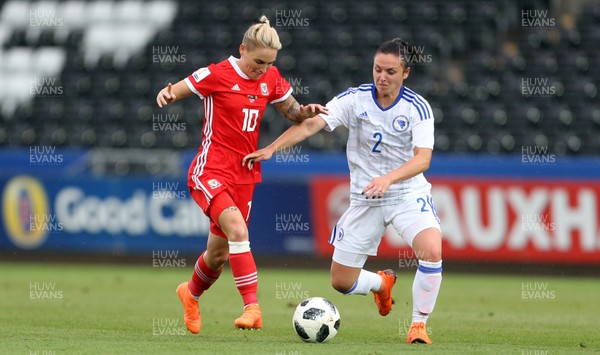 070618 - Wales Women v Bosnia Women - FIFA Women's World Cup Qualifying Round - Jess Fishlock of Wales is challenged by Valentina Sakotic of Bosnia