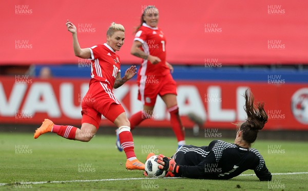 070618 - Wales Women v Bosnia Women - FIFA Women's World Cup Qualifying Round - Jess Fishlock of Wales has her shot at goal saved by Envera Hasanbegovic of Bosnia