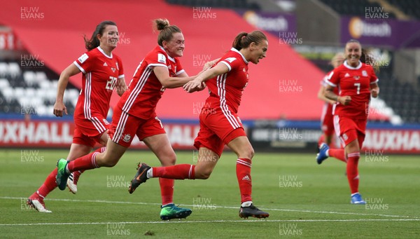 070618 - Wales Women v Bosnia Women - FIFA Women's World Cup Qualifying Round - Kayleigh Green of Wales celebrates scoring a goal with team mates Helen Ward and Rachel Rowe