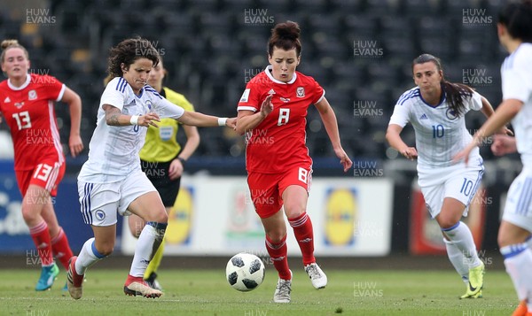 070618 - Wales Women v Bosnia Women - FIFA Women's World Cup Qualifying Round - Angharad James of Wales is challenged by Aida Hadzic of Bosnia
