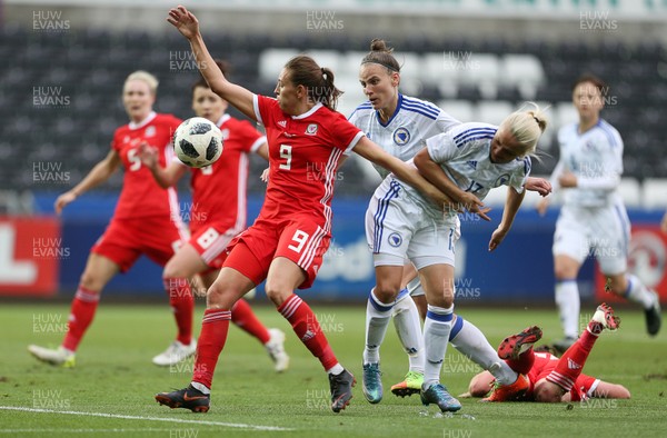 070618 - Wales Women v Bosnia Women - FIFA Women's World Cup Qualifying Round - Kayleigh Green of Wales is challenged by Marina Ludic of Bosnia