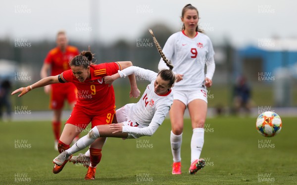 090421 Wales Women v Canada Women, International Friendly match - Kayleigh Green of Wales and Gabrielle Carle of Canada tangle as they compete for the ball