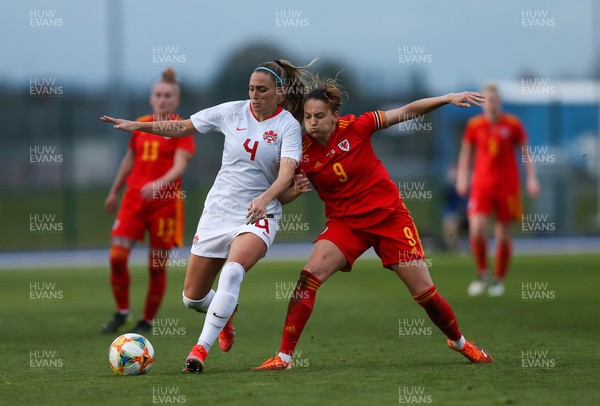 090421 Wales Women v Canada Women, International Friendly match - Kayleigh Green of Wales and Shelina Zadorsky of Canada compete for the ball