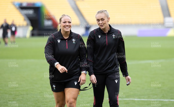 211023 - Wales Women v Canada Women, WXV1 - Kelsey Jones of Wales and Hannah Jones of Wales return to the changing rooms after they walk out for a look at the Sky Stadium