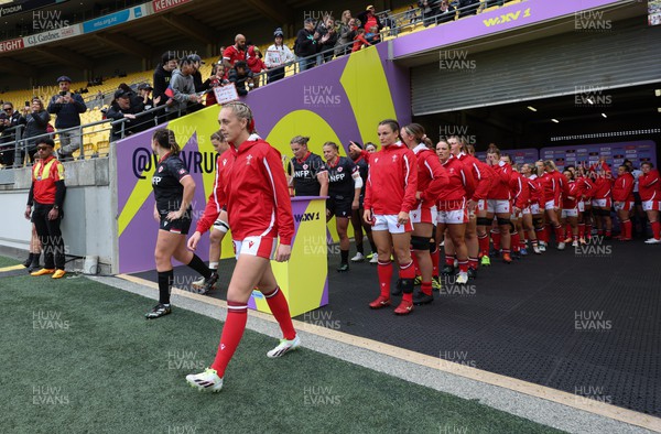 211023 - Wales Women v Canada Women, WXV1 - Hannah Jones of Wales leads the team out on her 50th cap