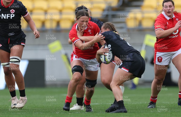 211023 - Wales Women v Canada Women, WXV1 - Alisha Butchers of Wales gets to grips with Justine Pelletier of Canada