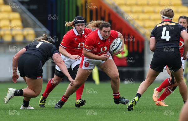 211023 - Wales Women v Canada Women, WXV1 - Gwenllian Pyrs of Wales charges forward with Bethan Lewis of Wales in support