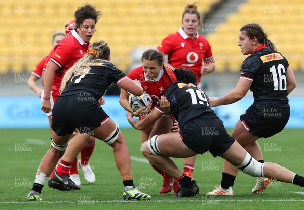211023 - Wales Women v Canada Women, WXV1 - Jasmine Joyce of Wales is tackled by Ashlynn Smith of Canada