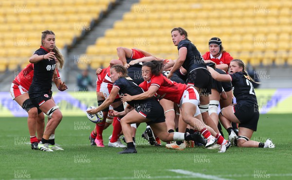 211023 - Wales Women v Canada Women, WXV1 - Justine Pelletier of Canada is tackled by Meg Davies of Wales