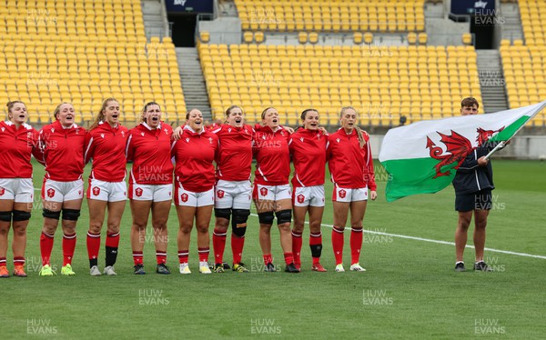 211023 - Wales Women v Canada Women, WXV1 - Members of the Wales team line up for the anthems - left to right, Kate Williams, Abbie Fleming, Lisa Neumann, Gwenllian Pyrs, Kelsey Jones, Bethan Lewis, Alisha Butchers, Jasmine Joyce and Hannah Jones
