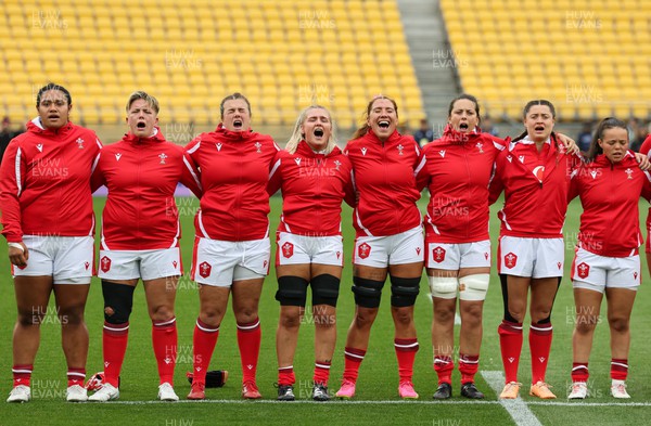 211023 - Wales Women v Canada Women, WXV1 - Members of the Wales team line up for the anthems - left to right, Sisilia Tuipulotu, Donna Rose, Carys Phillips, Alex Callender, Georgia Evans, Sioned Harries, Robyn Wilkins and Meg Davies