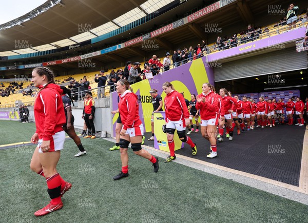 211023 - Wales Women v Canada Women, WXV1 - Jasmine Joyce of Wales, Alisha Butchers of Wales, Bethan Lewis of Wales and Kelsey Jones of Wales walk out at the start of the match