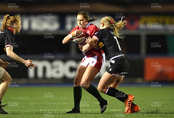 211121 - Wales Women v Canada Women - Autumn Internationals - Caitlin Lewis of Wales is tackled by Sara Kaljuvee of Canada