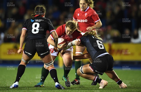 211121 - Wales Women v Canada Women - Autumn Internationals - Caryl Thomas of Wales is tackled by Courtney Holtkamp of Canada