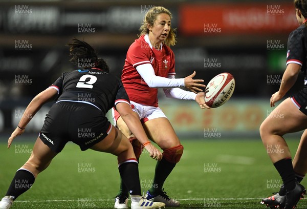 211121 - Wales Women v Canada Women - Autumn Internationals - Elinor Snowsill of Wales is tackled by Veronica Harrigan of Canada