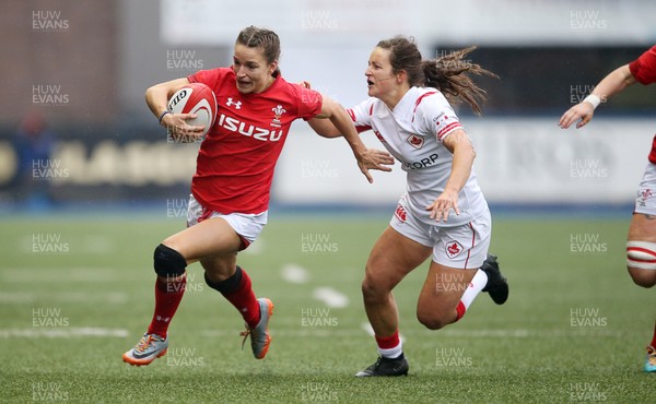 241118 - Wales Women v Canada Women - Friendly - Jasmine Joyce of Wales makes is challenged by Sabrina Poulin of Canada