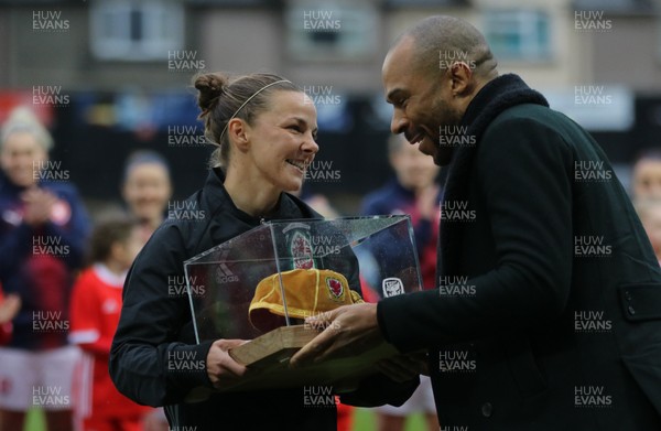 040419 - Wales v Czech Republic, Women's International Challenge Match - Loren Dykes of Wales receives a special cap from Danny Gabbidon to mark her 100th appearance 